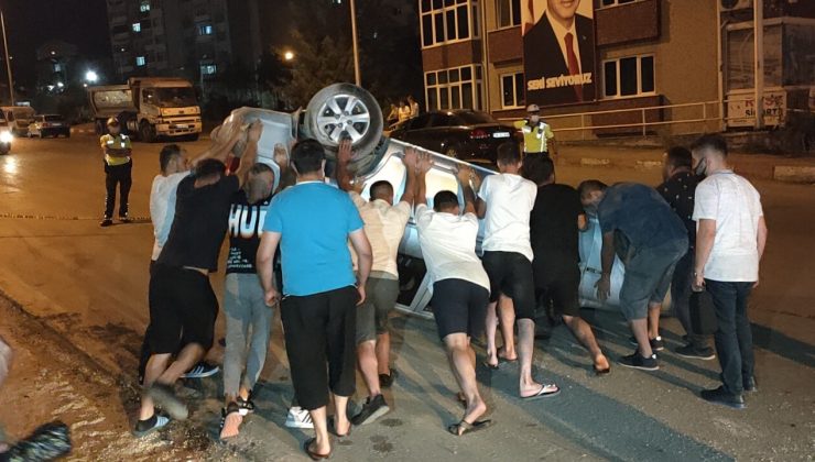 Ters dönen otomobilden yara almadan kurtuldular