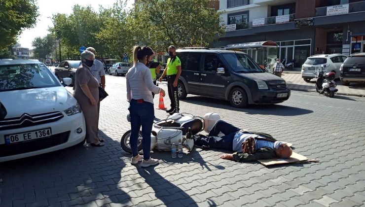 Elektrikli bisiklet otomobilin kapısına çarptı