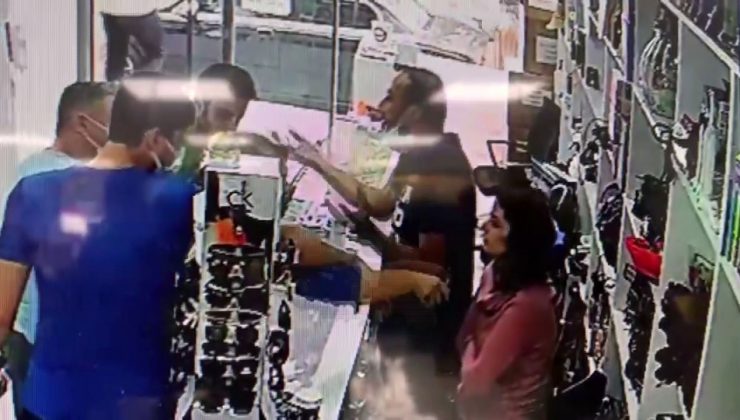 Tezgahtarın yüzüne çay döktü