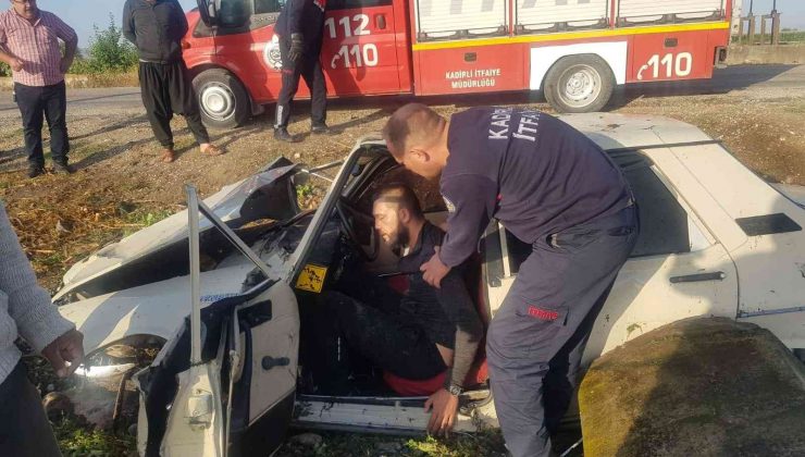 Tarlaya uçan otomobilin sürücüsü yaralandı